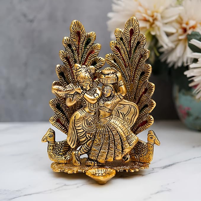 Amazon Brand - Umi Return Gift Radha Krishna Idol Showpiece Statue with Peacock Design Diya for Puja and Home Decor (8 x 6 Inches), Metal, Gold (1)